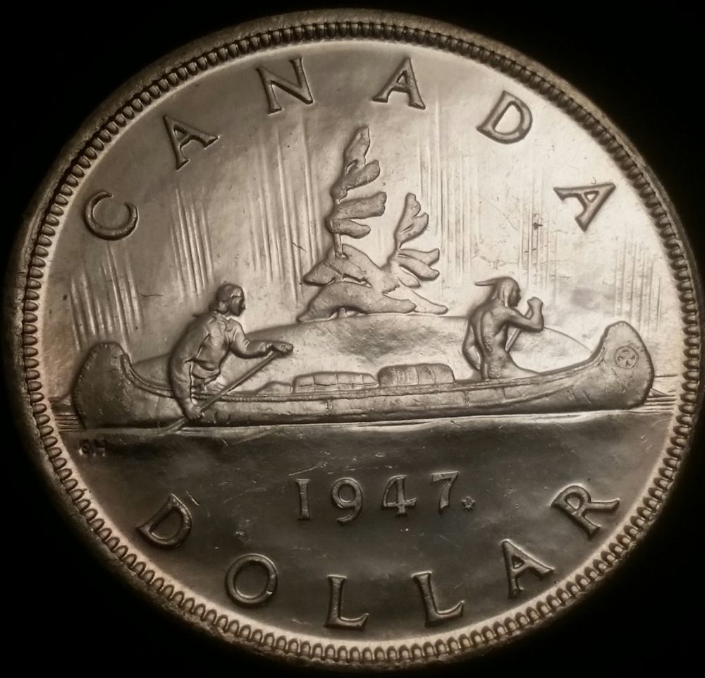 1947-Ml-Canadian-Silver-Dollar-For-Grade.